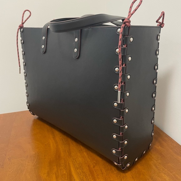 Elegant Black Coachtopia Tote with Red Lace Detailing - Picture 1 of 4